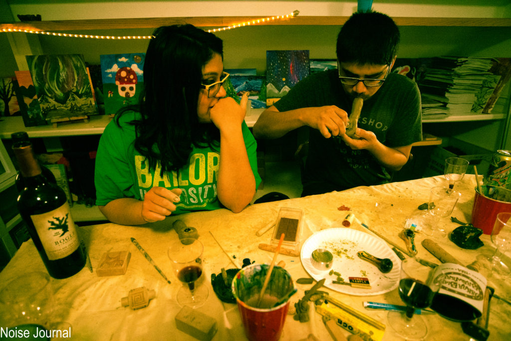 Participants at Denver’s Puff, Pass and Pottery class try out their new accessory on Friday, April 14, 2017. Perhaps surprisingly, smoking accessories were one of the least-made items at the cannabis themed event. By Jonathan Rose