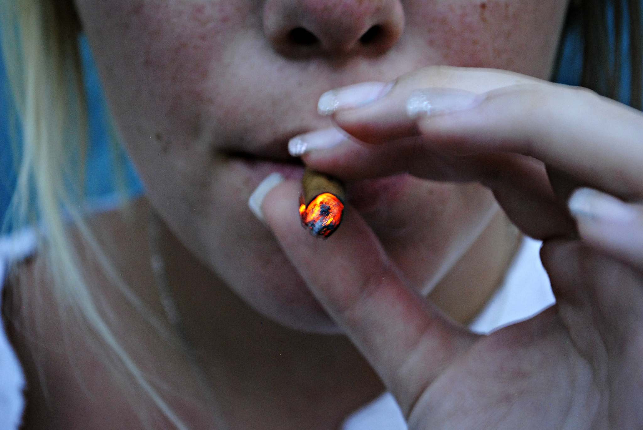 Girl smoking weed blunt